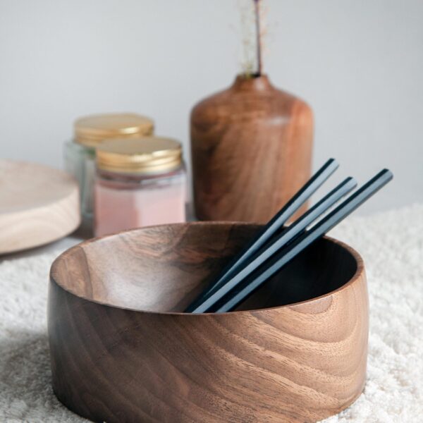 Handcrafted Figured Wallnut Bowl with black colored pencils.