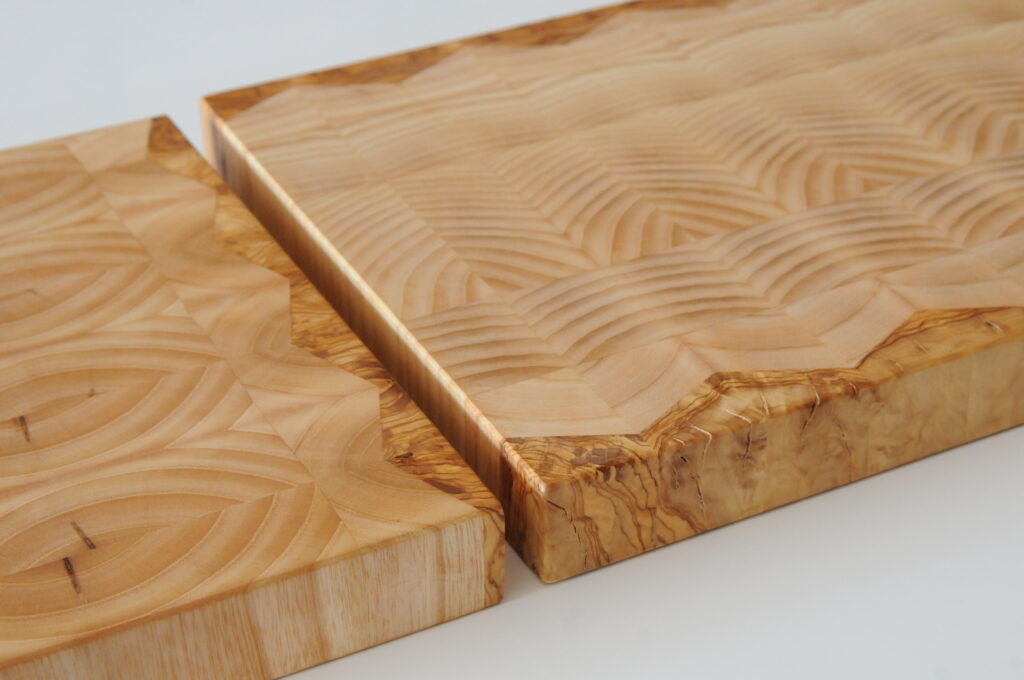 Stunning Chef's Choice Chopping Board, crafted from Ash, Walnut, and Venge Exquisitely patterned wooden cutting board, perfect for any kitchen High-quality wooden cutting board with a unique geometric design